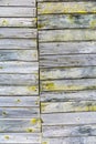 Grey wood background with yellow color peeling paint Royalty Free Stock Photo