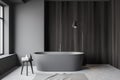Grey and wood bathroom interior, tub and lamp Royalty Free Stock Photo