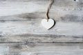 Grey wooden floor with a white wooden heart Royalty Free Stock Photo