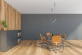 Grey wooden office room with shelf for folders, brown chairs and table Royalty Free Stock Photo