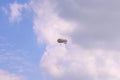 Grey zeppelin flies in cloudy sky Royalty Free Stock Photo