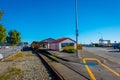 GREYMOUTH, NEW ZEALAND- MAY 24, 2017: Traffic waits for oncoming vehicles to cross a single lane road-rail bridge over