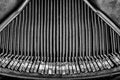 Greyscale closeup shot of the inner keys of a vintage typing machine Royalty Free Stock Photo