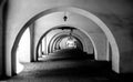 Greyscale scenery of an outdoor tunnel in Cracovia, Polonia Royalty Free Stock Photo