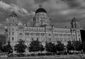 Greyscale shot of the beautiful architecture of the Port of Liverpool building