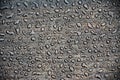 Greyscale shot of the drops of water on a wooden surface - perfect for a background Royalty Free Stock Photo