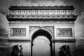 Greyscale shot of the famous historical Arch of Triumph in Paris, France Royalty Free Stock Photo