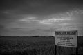 Greyscale shot of a sign forbidding entry to everything Royalty Free Stock Photo