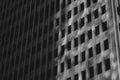 Greyscale of windows of a modern building with shadows under the sunlight in Charlotte Royalty Free Stock Photo