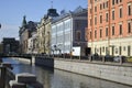 Griboedov channel embankment. Italian Bridge, multicolored buildings in sunshine Royalty Free Stock Photo