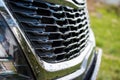 Grid of car. Radiator grille. Metal close-up texture background. Chrome grill of big powerful engine macro. Auto detail Royalty Free Stock Photo