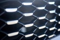 Grid of car. Radiator grille. Metal and plastic closeup texture background. Chrome grill of engine macro selective focus Royalty Free Stock Photo