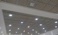 Grid ceiling and gypsum ceiling make an nice architectural interior false ceiling view or design for an commercial building such