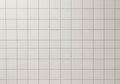 A grid of uniform, square ceramic tiles is arranged across the surface. The tiles are Royalty Free Stock Photo