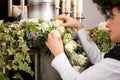 Grief - female mortician preparing urn Funeral Royalty Free Stock Photo