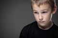 Grief-stricken little boy - feeling intense sorrow Royalty Free Stock Photo