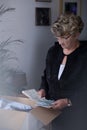 Grieving woman with souvenirs