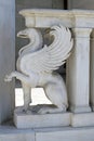 Griffin is a decoration element of an ancient building in Greece.