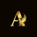 Griffin silhouette inside gold letter A. Heraldic symbol beast ancient mythology or fantasy. Creative design elements for logotype