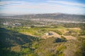 Griffith Park hiking trail. Aerial view of Burbank cityscape from Hollywood Hills Royalty Free Stock Photo