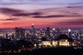 Griffith Park Observatory in front on downtown Los Angeles at sunrise. Royalty Free Stock Photo