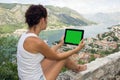 Gril with tablet computer with green screen