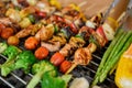 Grill and Barbecue party at home. Cooking BBQ pork, beef, chicken, seafood and vegetables. Family lifestyle and friend Royalty Free Stock Photo