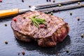 Grill beef steak. Portions thick beef juicy sirloin steaks on grill teflon pan or old wooden board