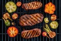 Grill brimming with perfectly seared meats and colorful vegetables