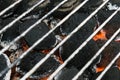 Grill charcoal bbq briquettes with hot metal grid Royalty Free Stock Photo