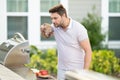 Grill chef cook. Guy with BBQ cooking tools. Barbecue and grill. Picnic and barbecue party. Chief cook with utensils for Royalty Free Stock Photo