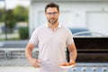 Grill chef cook. Guy with BBQ cooking tools. Barbecue and grill. Picnic and barbecue party. Chief cook with utensils for Royalty Free Stock Photo