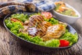 Grill Chicken Breast. Roasted and grill chicken breast with lettuce salad tomatoes and mushrooms Royalty Free Stock Photo