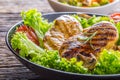 Grill Chicken Breast. Roasted and grill chicken breast with lettuce salad tomatoes and mushrooms Royalty Free Stock Photo