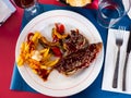 Grill dish Churasco of beef with barbecue sauce with vegetables Royalty Free Stock Photo