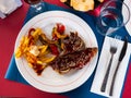 Grill dish Churasco of beef with barbecue sauce with vegetables Royalty Free Stock Photo