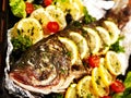 Grill fish at oven-tray . Royalty Free Stock Photo