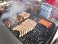 Grill frying fresh meat barbecue sausages, BBQ picnic sandwich store Royalty Free Stock Photo