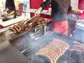 Grill frying fresh meat barbecue sausages, BBQ picnic sandwich store Royalty Free Stock Photo