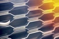 Grill grid of car macro chrome detail pattern background with sun flare. Radiator grille. Metal close-up texture Royalty Free Stock Photo
