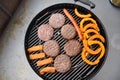 Grill with hamburgers, sausages and pumpkin Royalty Free Stock Photo