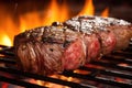 grill marks visible on a sizzling asado cut