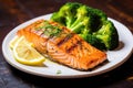 Fish cooked fillet green plate dinner grill meal healthy dish seafood salmon food Royalty Free Stock Photo