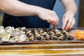 Grill oyster and clam on metal net Royalty Free Stock Photo