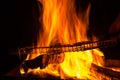 Grill rack on fire Royalty Free Stock Photo