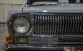 Grille and headlight of vintage car GAZ-24 Volga Royalty Free Stock Photo