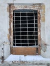 Lattice on the window in an old ruined house Royalty Free Stock Photo