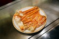 Grilled Alaskan king crab legs Snow crab on teppanyaki grill plate, Prepared for Teppanyaki style, Enjoy the spectacle of a Royalty Free Stock Photo