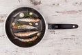 Grilled anchovy fish on pan. Royalty Free Stock Photo