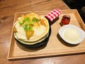 Grilled apples and cream brulee pancakes served with honey and vanilla ice cream.